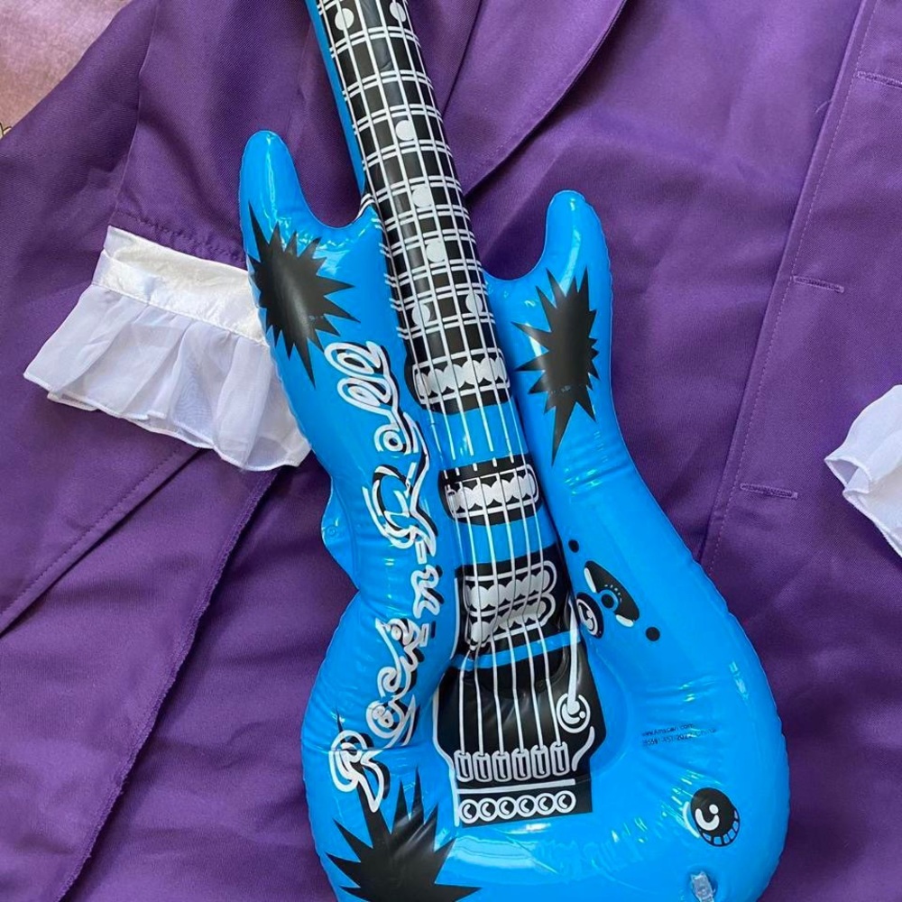 New 
used once for 2 hours 
Inflatable 
Blue 
Rock n Roll 
Guitar